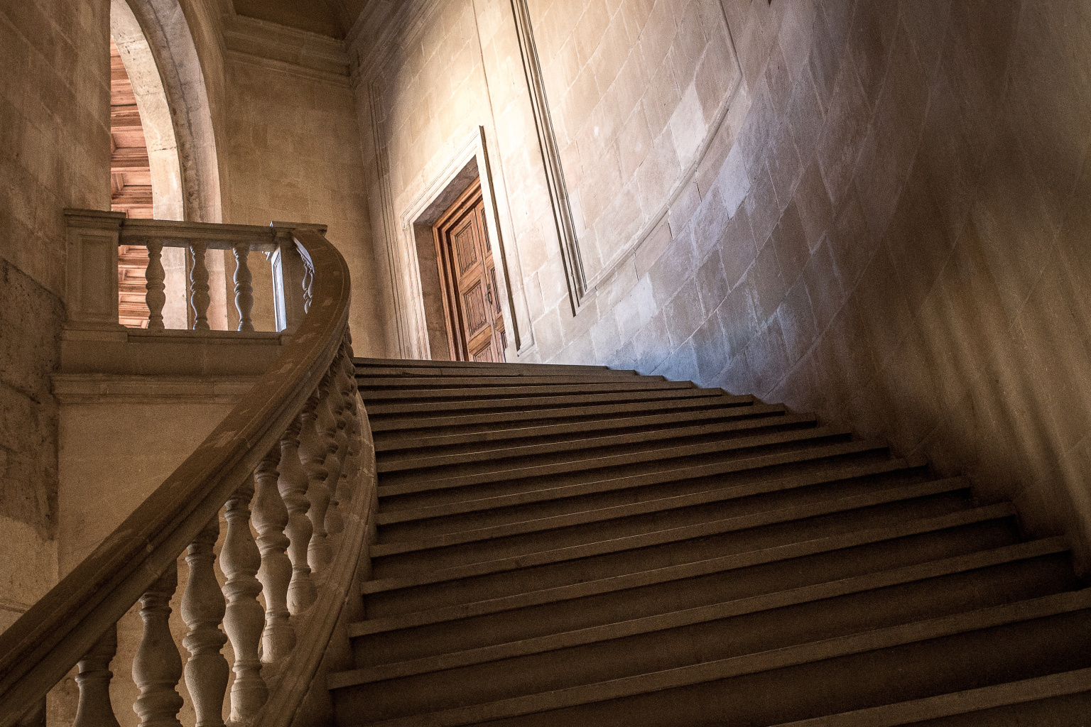 low-angle-shot-stairs-as-they-lead-door-building.jpg