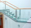 Стеклянные ступени и стеклянная площадка на лестнице в Алматы. Готовые проекты ПерилаГлавСнаб - фото 1